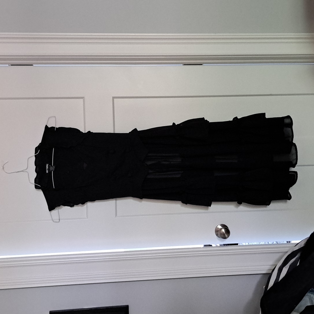 Black high low ruffle vest